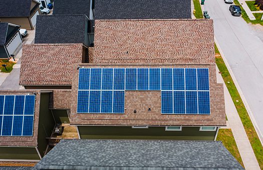 solar panels are installed at the roof of the house for cheap and clean energy.