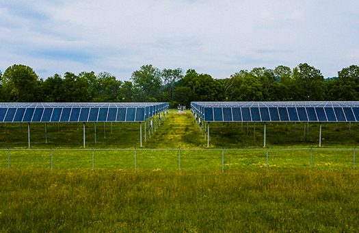 There is a modern agriculture control shed fitted with solar panels.