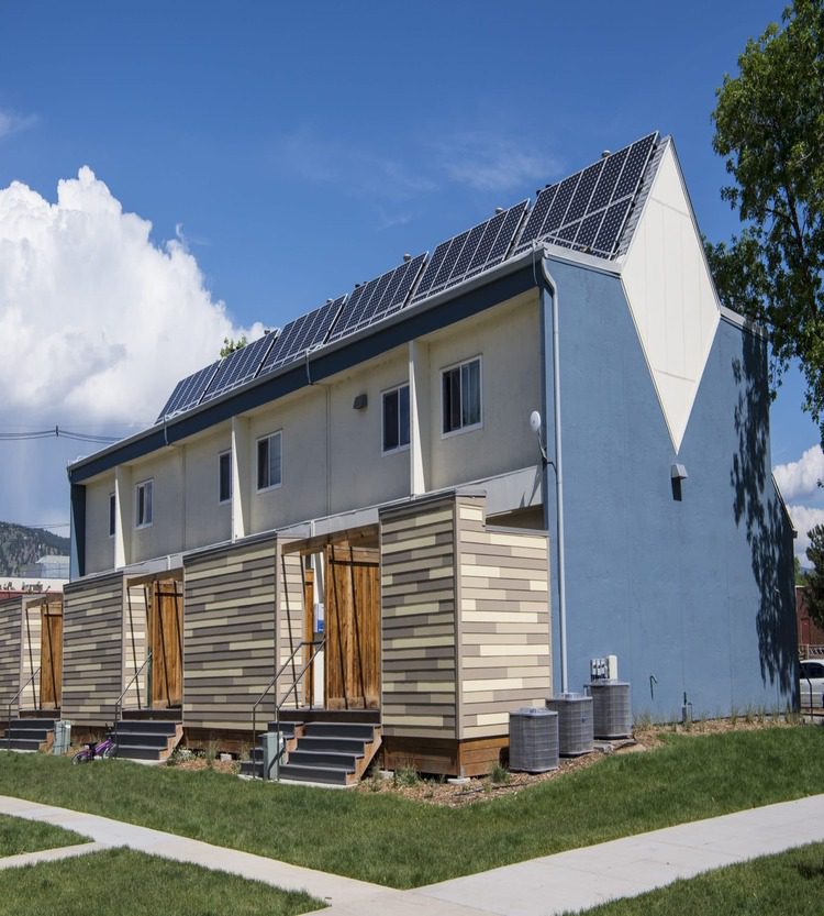 cheap solar panels are installed at the roof top of a house.